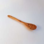 Spoon for Olives with 9 holes
